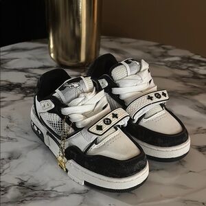 Louis Vuitton Black and White Sneakers Retro-Inspired Design